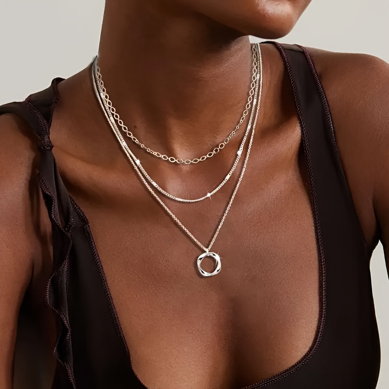 Stylish Multilayered Choker Style Collar Accented by Smooth Oval Pieces Available In Shimmering Finish