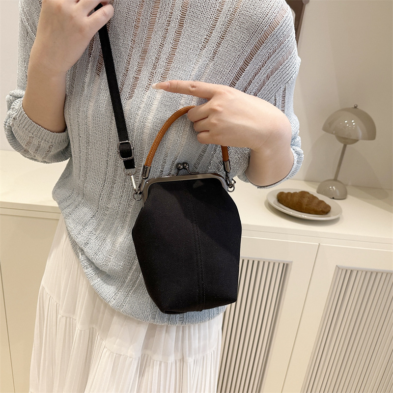 Korean style hand-held small square women's 2025 summer new item niche light luxury shoulder internet famous trendy crossbody bag