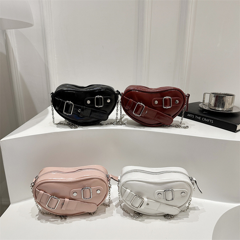 Small and high-end hand-held love women's 2025 summer new fashion versatile shoulder trendy armpit bag