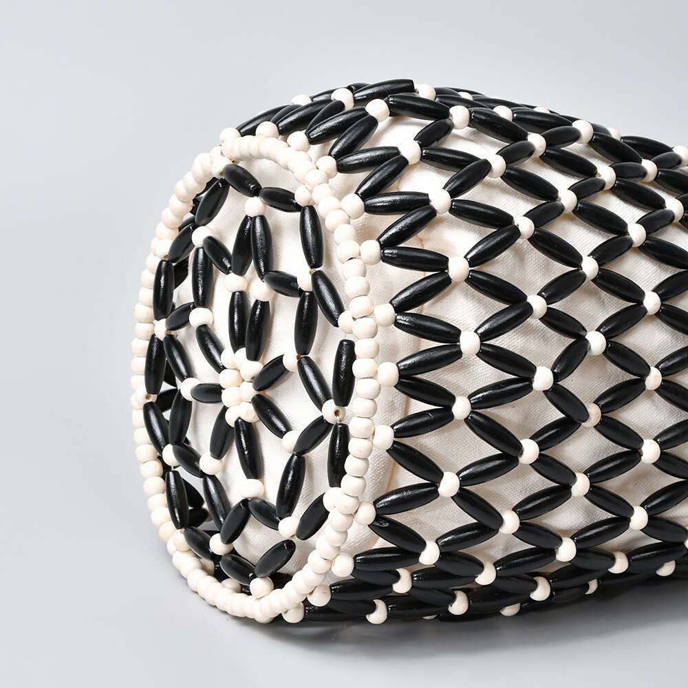 Elegant Woven Tote with Unique Hole Cutout Detailing: Ideal Casual Daytime Accessory