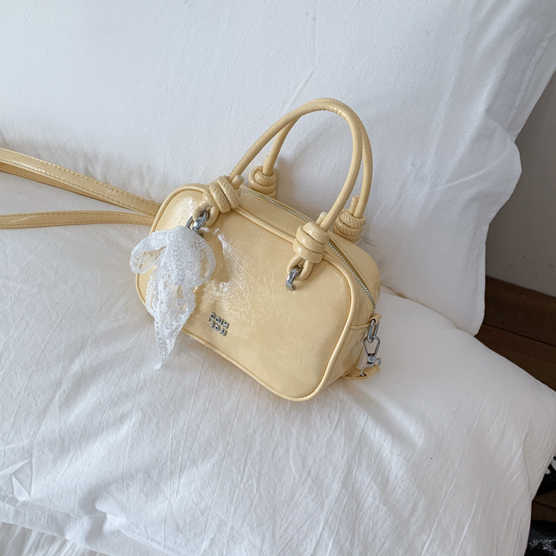 Light luxury hand-held small square women's 2025 summer new style temperament versatile shoulder internet famous trendy crossbody bag