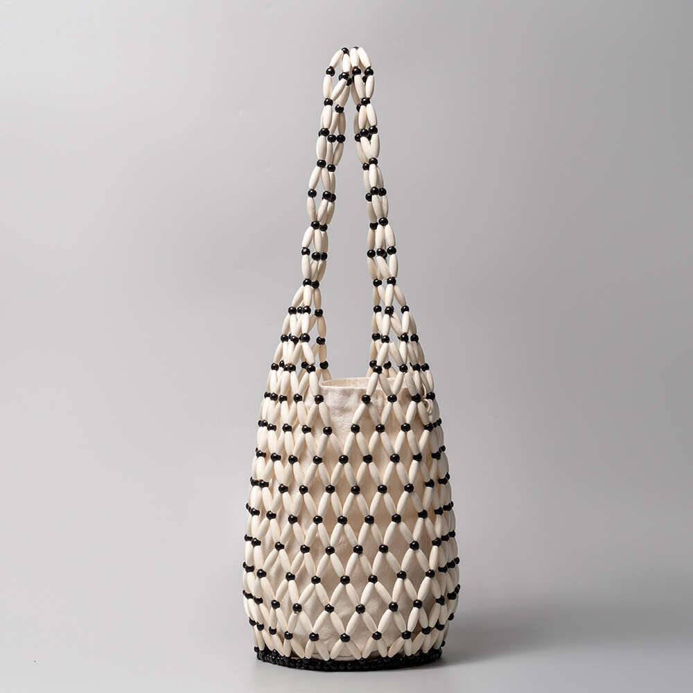 Elegant Woven Tote with Unique Hole Cutout Detailing: Ideal Casual Daytime Accessory