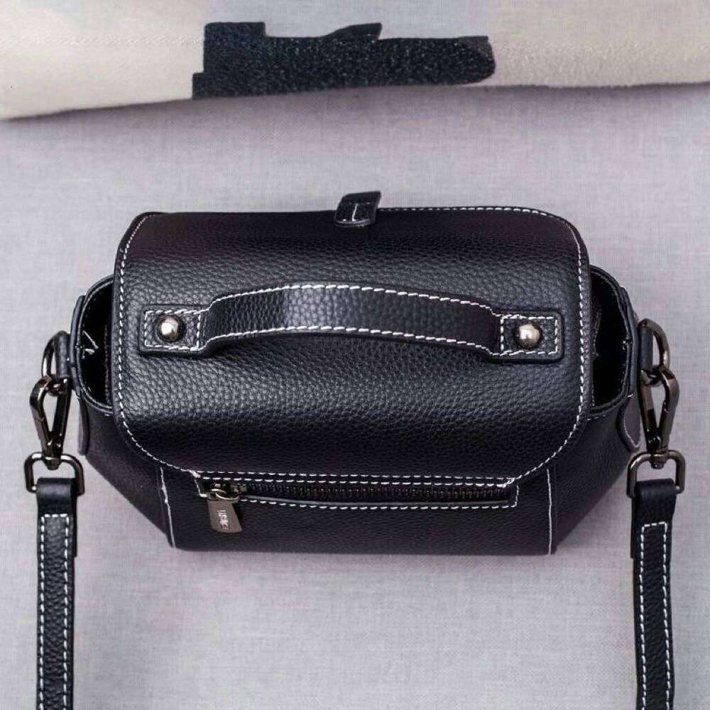 First layer cowhide women's 2025 new genuine leather shoulder crossbody large capacity handheld commuting light luxury small bag
