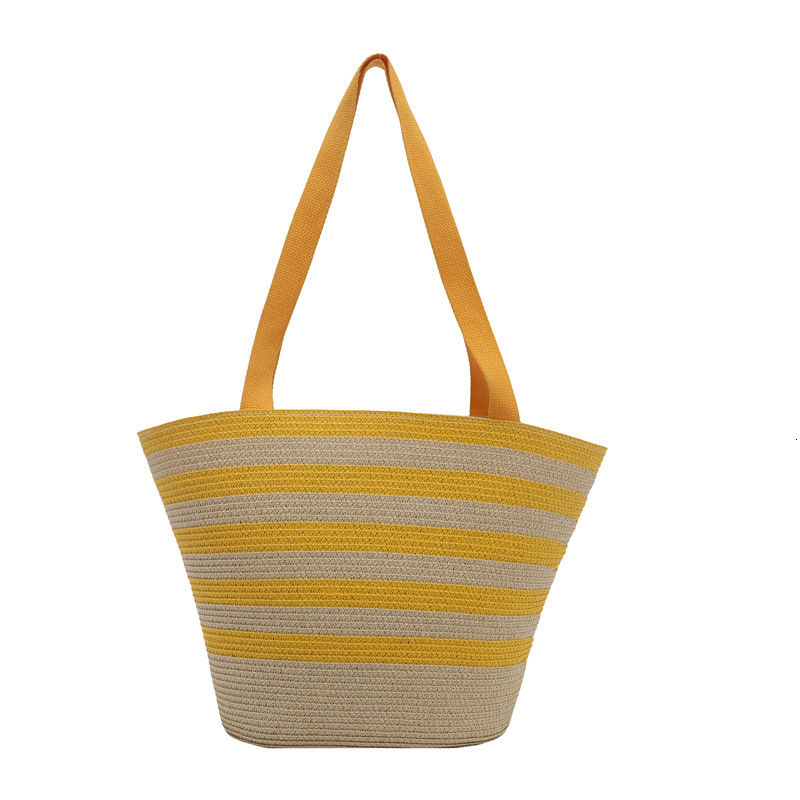 Color blocking hand-held bucket women's 2025 summer new item light luxury grass woven shoulder fashionable armpit bag