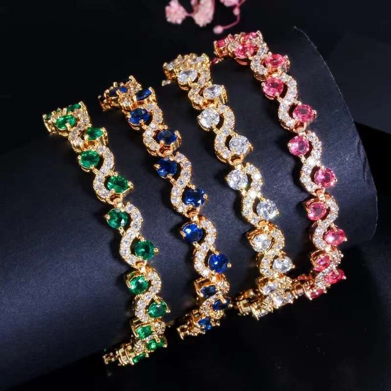 elegant rainbow hued charm bangle by designer vibrant zirconia accents versatile tonal options