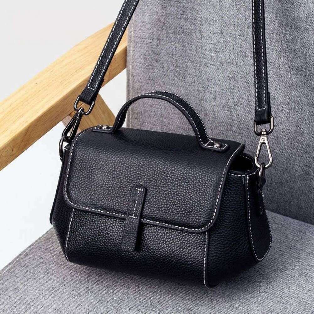 First layer cowhide women's 2025 new genuine leather shoulder crossbody large capacity handheld commuting light luxury small bag