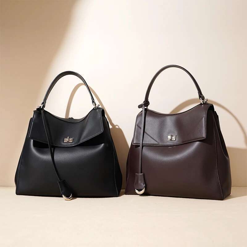 New Women's Backpack Sier Lock Cowhide Handbag Soft Fashion Niche Design Brand Tote Classic High-End Shoulder Bag