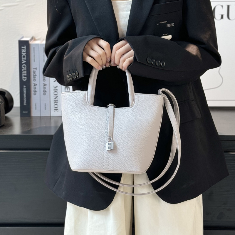 Simple Handheld Bucket Korean Edition Western Style Shoulder Solid Color Commuter Crossover Women's Bag