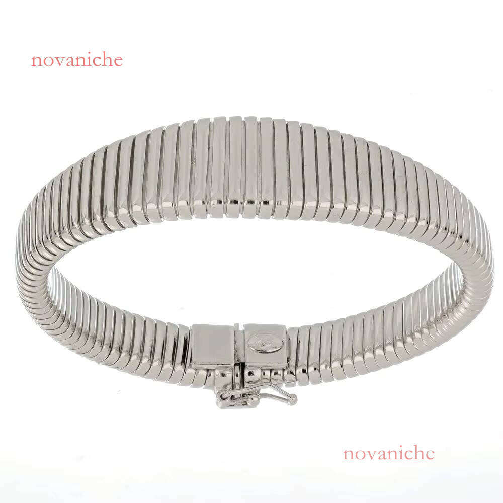 A sier bracelet made in Italy with smooth spine design a secure clasp, exuding modern elegance and practicality