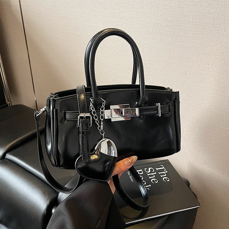2025 summer new niche design handbag fashionable commuting shoulder crossbody high-end sense bag