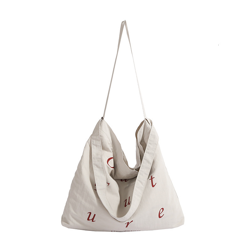 Fashion niche hand-held tote women's 2025 summer new large capacity shoulder trendy versatile crossbody bag