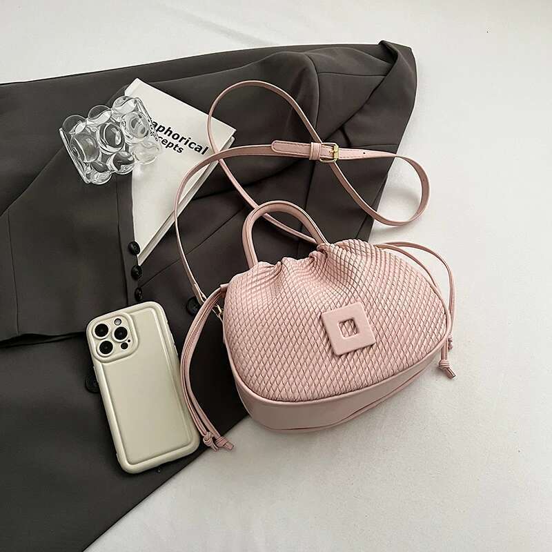 In 2024, The New Solid-Color High-Grade Pleated Rhomboid PU Shoulder Bag Is Small Delicate, Simple And Generous