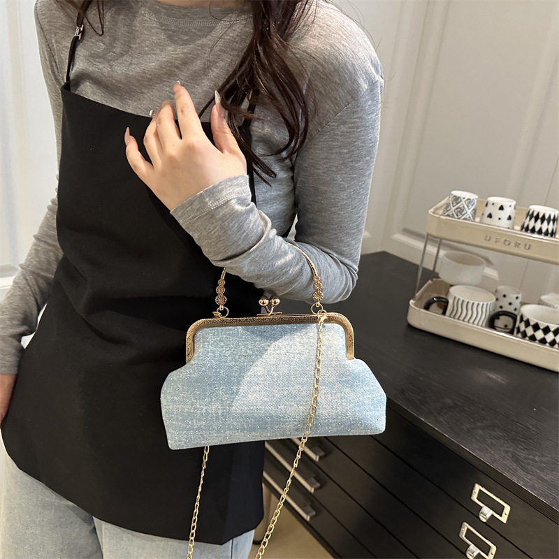 Fashion metal hand-held cheongsam women's 2025 summer new pearl light luxury shoulder chain crossbody bag