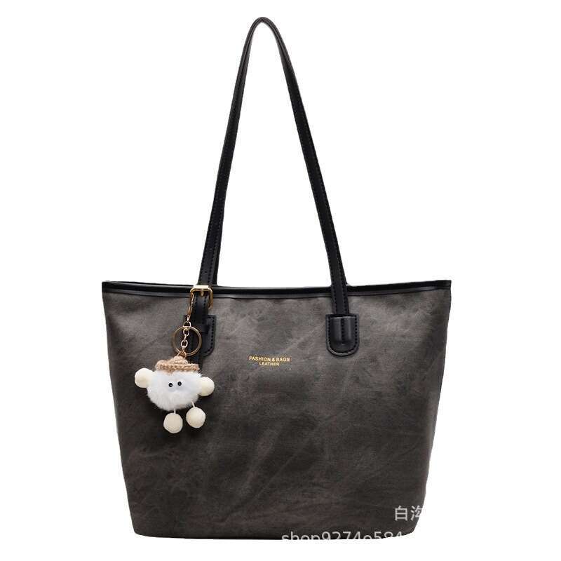 Texture large capacity underarm tote women's 2025 new Korean version fashionable contrasting color single back commuting bag trend