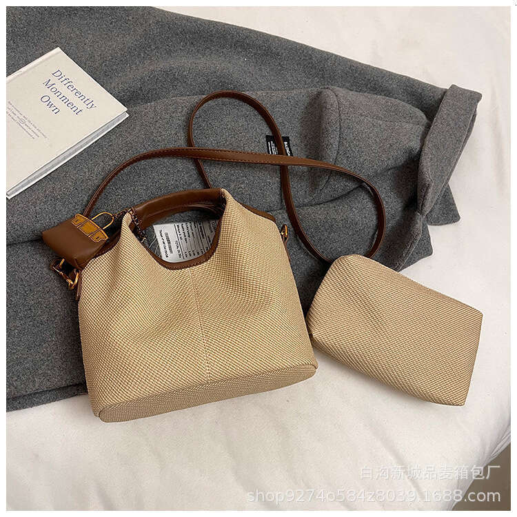 New leopard print tote fashionable and versatile handbag, one shoulder crossbody bucket, bag, high-end feeling, women's baozi mother bag