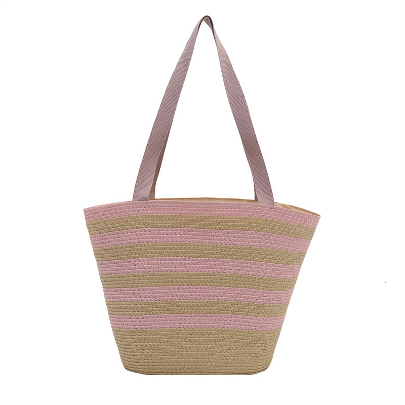 Color blocking hand-held bucket women's 2025 summer new item light luxury grass woven shoulder fashionable armpit bag