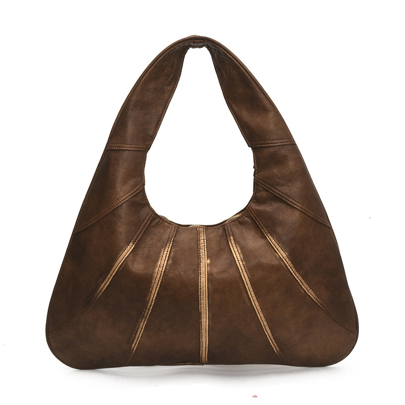Niche design handbag women's 2025 summer new fashion splicing shoulder commuting armpit bag