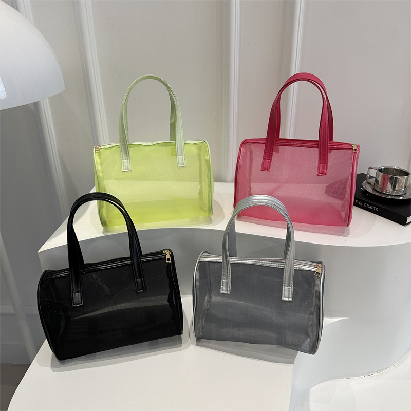 Portable hand-held small square women's 2025 summer high-end makeup popular trend storage bag