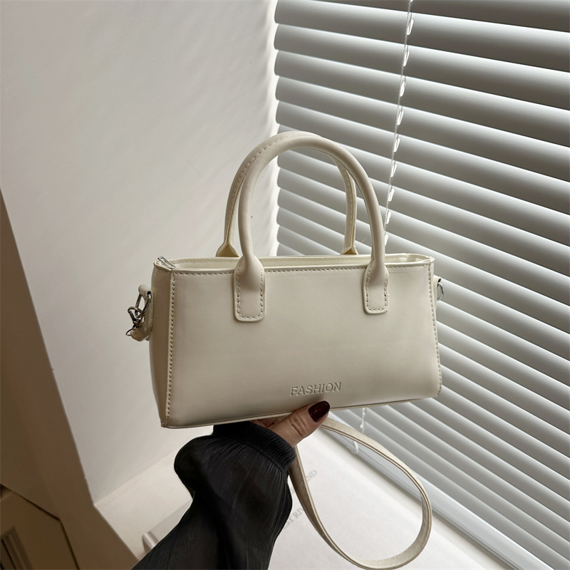 Minimally Handheld Small Square 2025 Spring And Summer New Style New Free Delivery Designer Bag High End Luxury Bag Fashion Shoulder Korean Edition Ni
