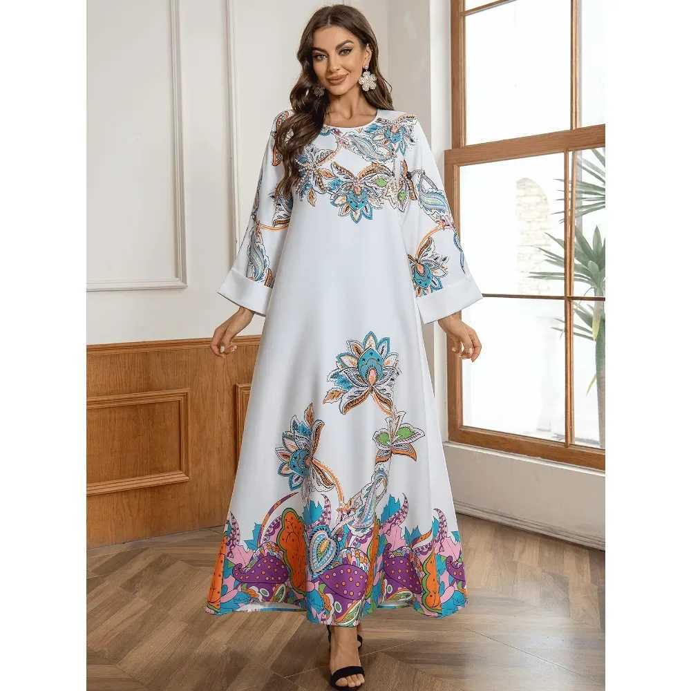 Turkish Muslim ladies elegant abaya It is a new-style printed V-neck dress from Dubai Arabia adorned with dded beads X250514