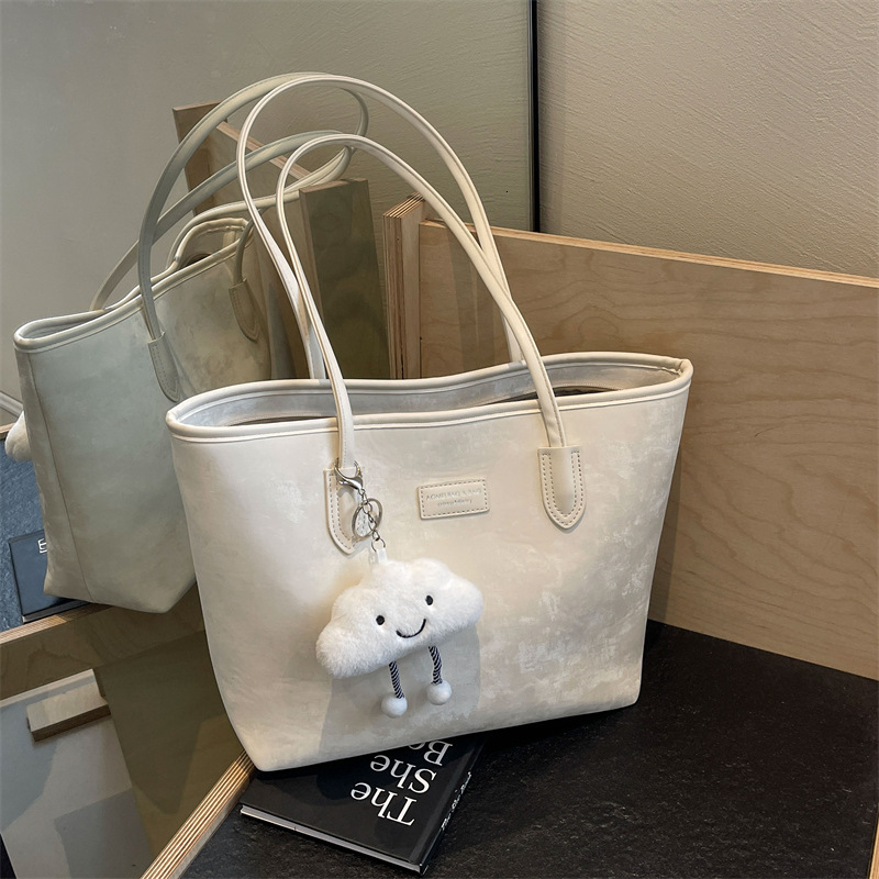 Fashionable and casual capacity tote women's new 2025 large high-end sense, niche commuting bag, trendy shoulder bag