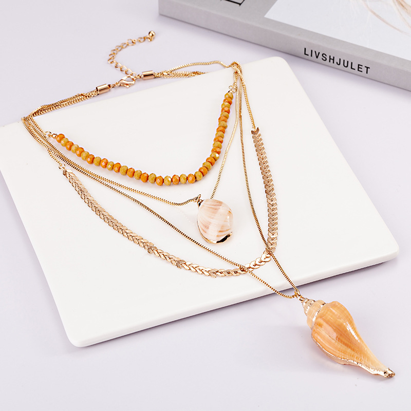 Multiple sets of snail shell crystal chain necklaces for direct sale