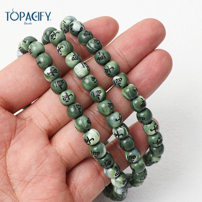 Muslim held in hand, counting 99 beads. Arabic bracelet prayer beads