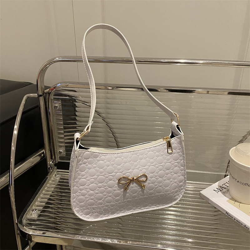 Underarm Luxury For Women 2025 Butterfly Knot Woven Pattern Spring Small Square New Free Delivery Designer Bag Bag Simple And Casual Single Luxury Bag