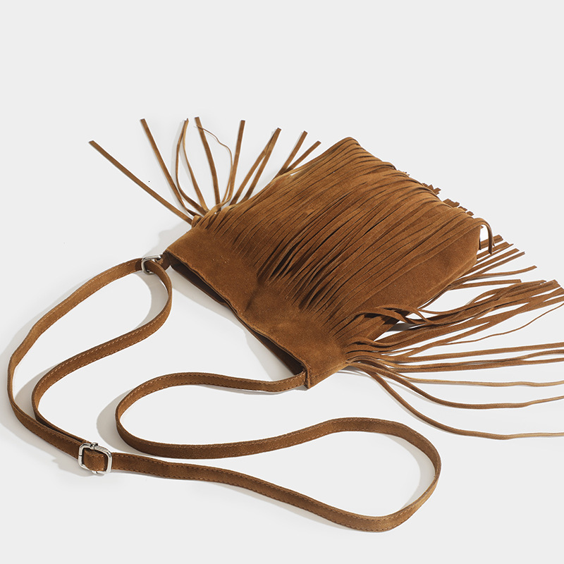 2025 New American Bohemian Tassel Classic Fashion Designer Multi functional Advanced Retro Versatile Saddle Thai Cool and Spicy Crossbody Bag Underarm