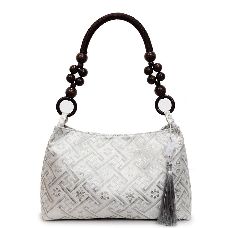 2025 new summer niche Chinese women's bag, new multi-functional commuting single shoulder designer armpit bag, Chinese style light luxury hand-he