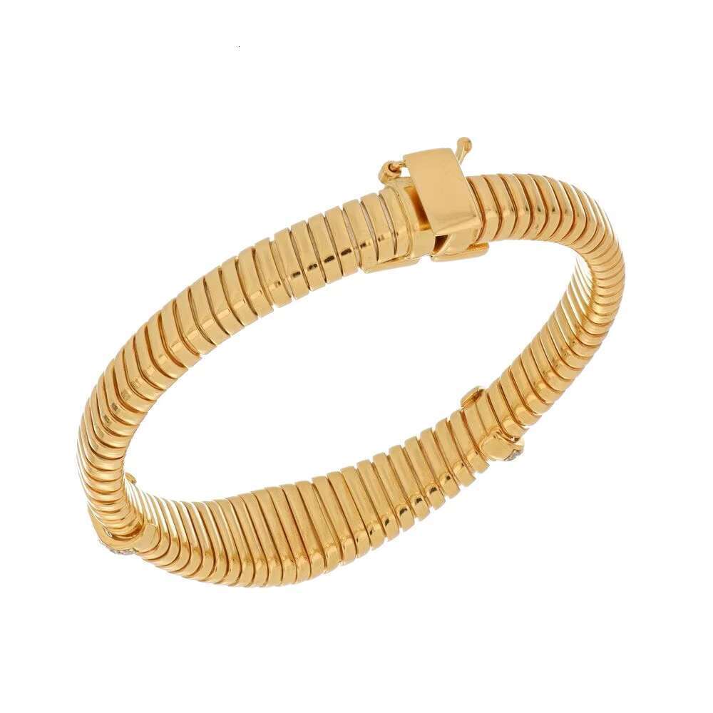 Made in Italy, this elegant gold bracelet features spine like texture and a shiny accent, making it an accessory for any ocn