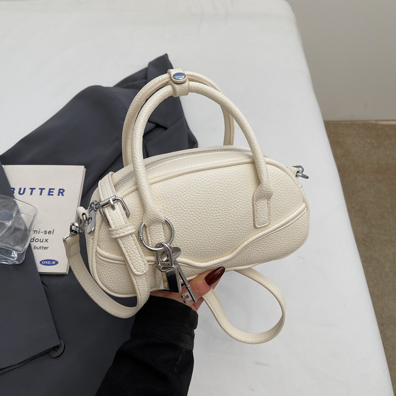 2025 new designer bag, fashionable and niche design, portable bowling, 2025 new temperament, Korean commuting crossbody bag, atmospheric retro tempera
