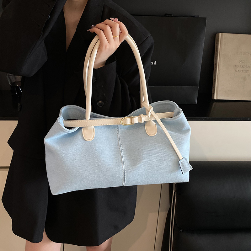 Commuting large capacity denim cloth for women 2025 new spring and summer contrasting color handbag, casual single shoulder tote bag