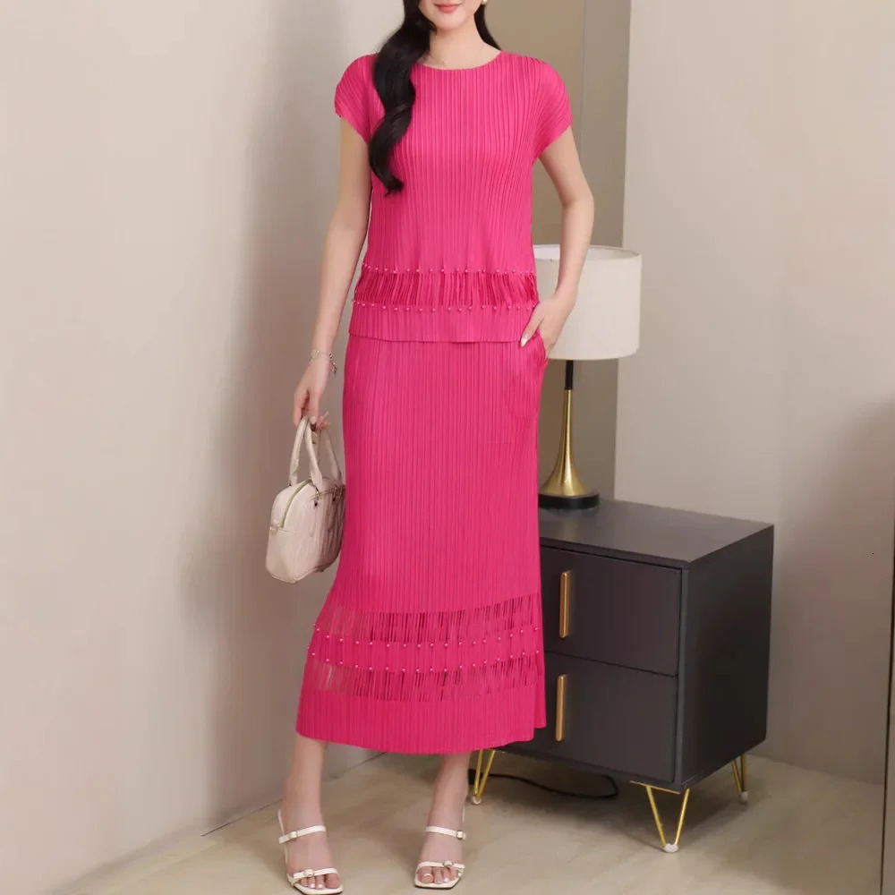 Miyake Style Pleated Fashionable Casual and Versatile Suit for Women Summer Round Neck Top Hollow Skirt Twopiece Set 250514