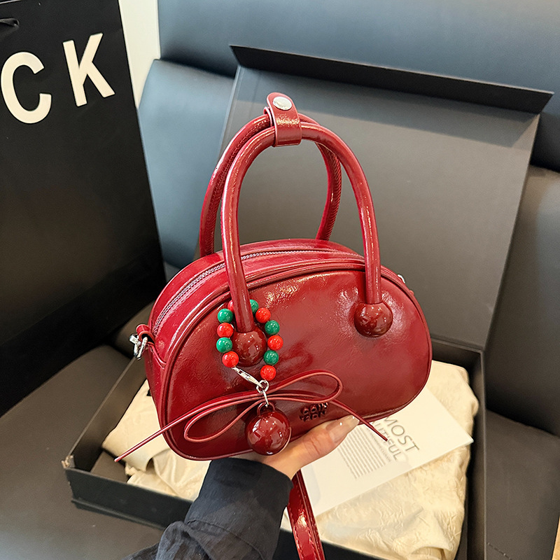 Pillow 2025 new popular solid color small bag, women's hand-held shoulder crossbody bag
