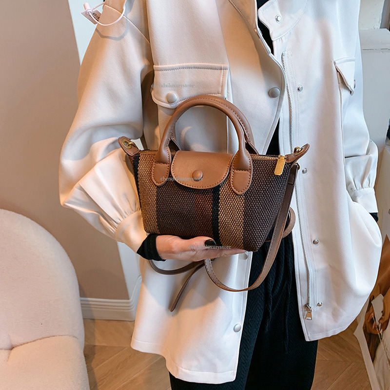 2025 Free Shipping Designer Women's Bag Shoulder Bag Summer New Tote Pattern Handbag High Quality Fashion Casual Crossbody Bag Makeup Bag