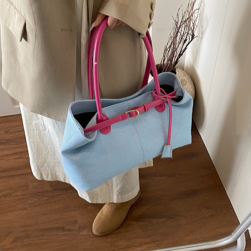 Commuting large capacity denim cloth for women 2025 new spring and summer contrasting color handbag, casual single shoulder tote bag