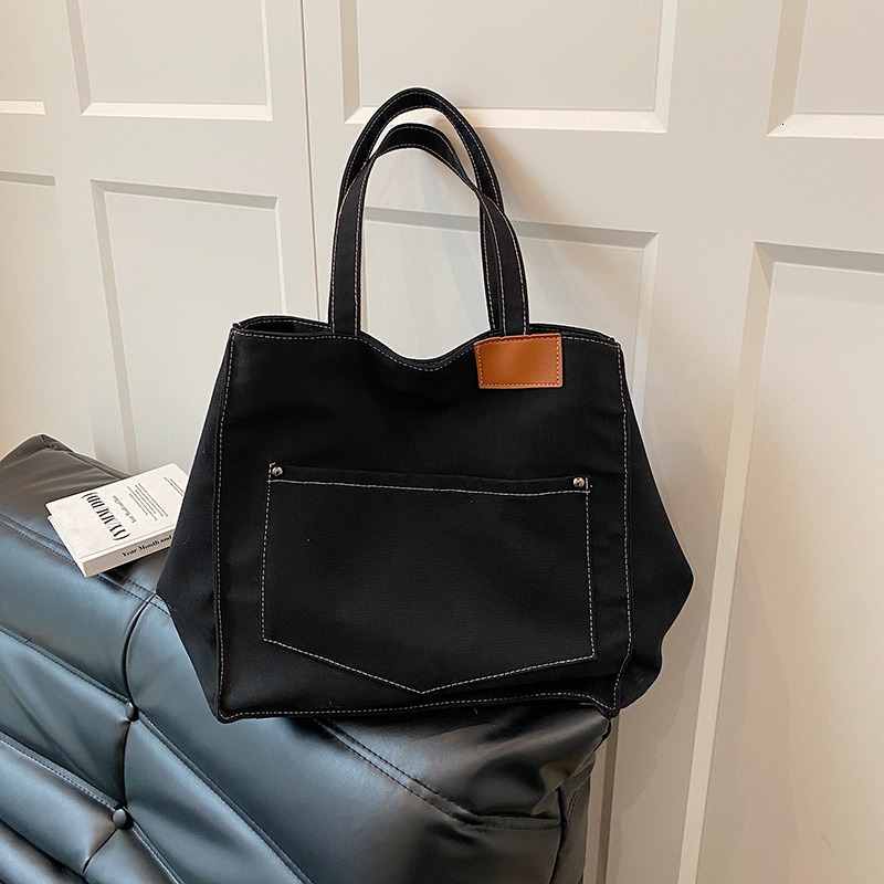 Fashion New Free Delivery Designer Luxury Bag Bag Canvas Handbag Women's Large Capacity Casual Shoulder Commuting Bag
