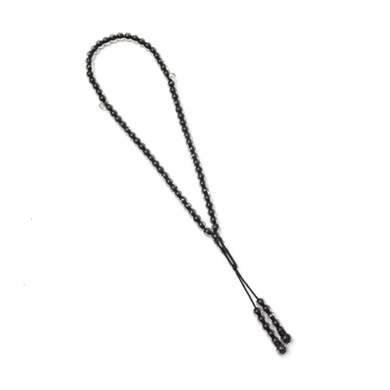 Handstring Cook holding 66 beads of praise, prayer beads, Muslim accessories