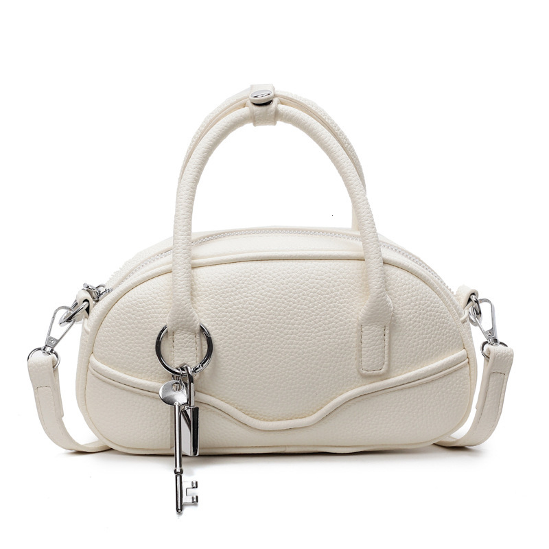 2025 new designer bag, fashionable and niche design, portable bowling, 2025 new temperament, Korean commuting crossbody bag, atmospheric retro tempera