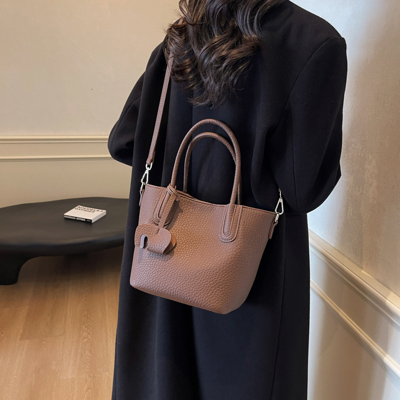 Designer handbag high end Western style women autumn and winter new fashion multifunctional basket bag single shoulder crossbody bag mini storage bag 