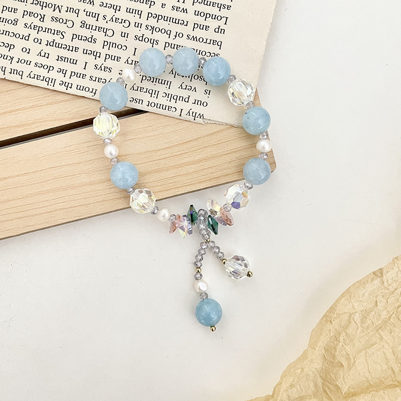 Minimalist navy blue stone women's temperament fashionable pearl pendant with adjustable elasticity 14K electroplating bracelet