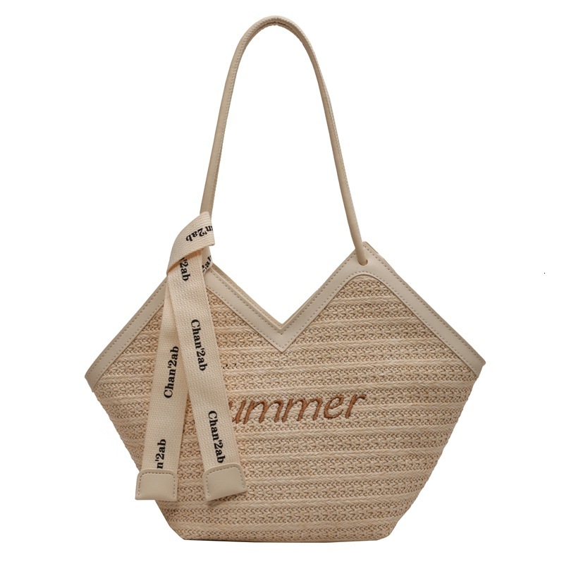 Summer large capacity 2025 new grass women's niche design shoulder versatile woven tote bag