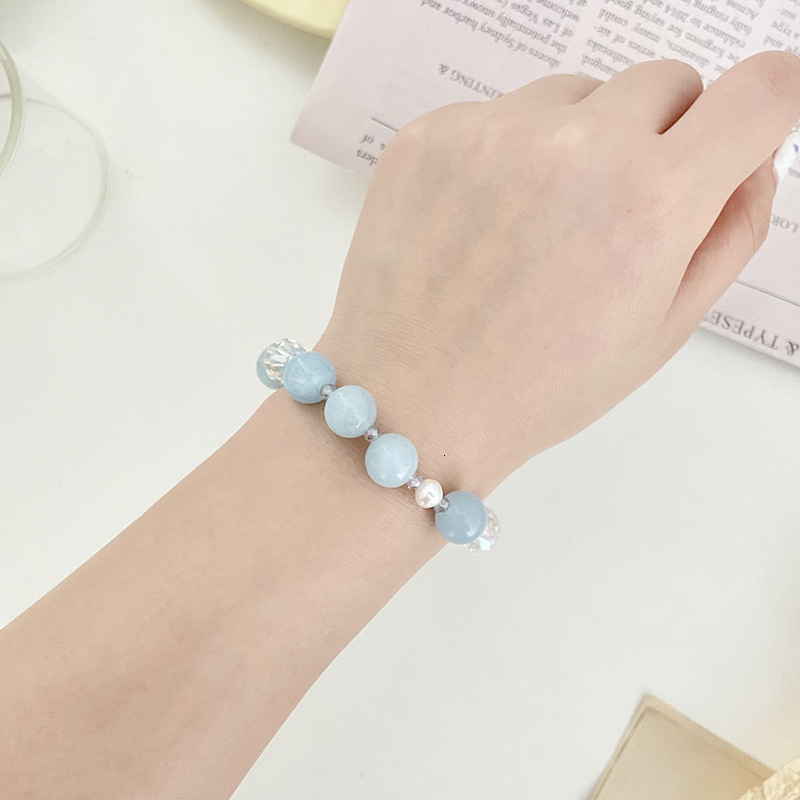 Minimalist navy blue stone women's temperament fashionable pearl pendant with adjustable elasticity 14K electroplating bracelet
