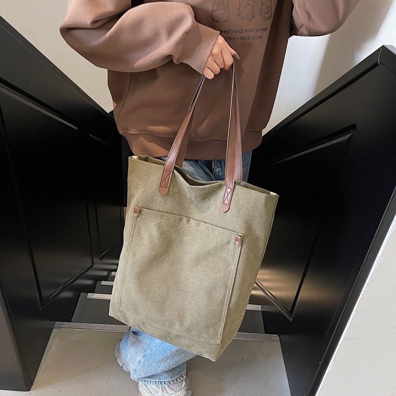 Canvas men's large capacity handheld 2025 new fashion spring simple shoulder bag versatile casual tote for women