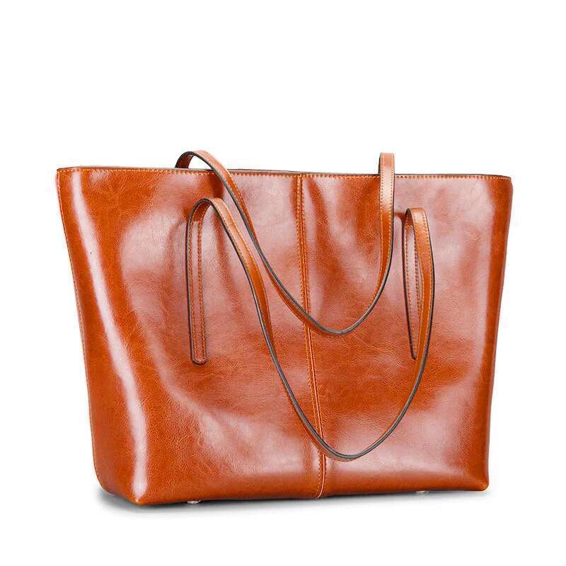 Vintage Cowhide Ladies 2025 New Tote Bag Large Capacity Female Leather Versatile Commuter Shoulder Bags