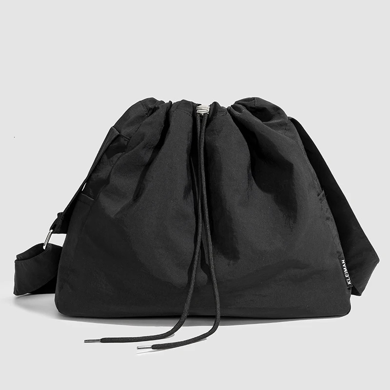 Large capacity drawstring sports wind dumpling bag lightweight small niche tote commuting versatile shoulder crossb 250514