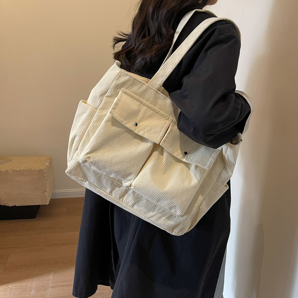 Lazy style large capacity canvas for women 2025 new fashion student class computer bag, one shoulder portable tote bag