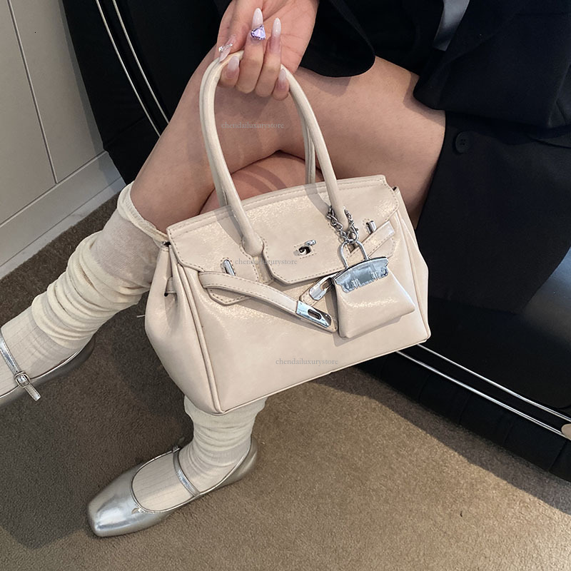 2025 Free Shipping Designer Women's Bag High-end Texture Large Capacity Handbag Fashionable Buckle Strap Single Shoulder Crossbody Bag Casual Com