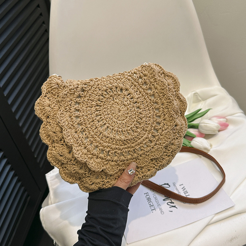 2025 New Designer Bag Lace Slant Body Cotton Thread Hollow Single Shoulder Grass Weaving Vacation Style Beach Bag Multi functional Women's Bag